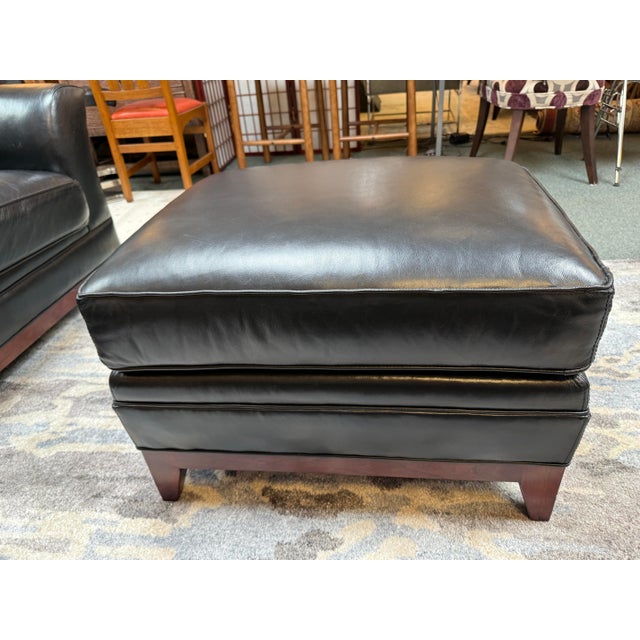 Design Plus Gallery presents the Keeler Ottoman from Stickley. The ottoman is made in the brands smooth, fine black...