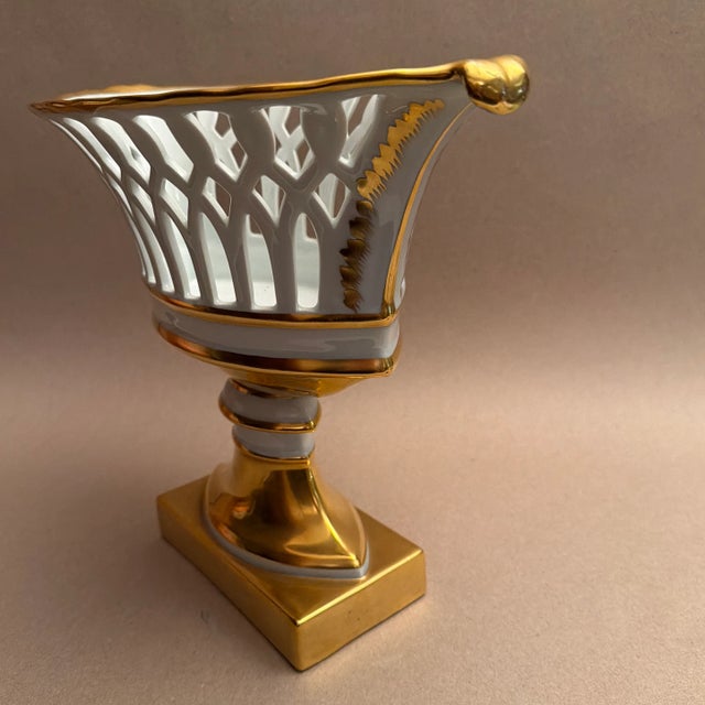 Extremely fine porcelain basket, with 24k gold paint, 11.5” x 14.5” in excellent survivor condition.