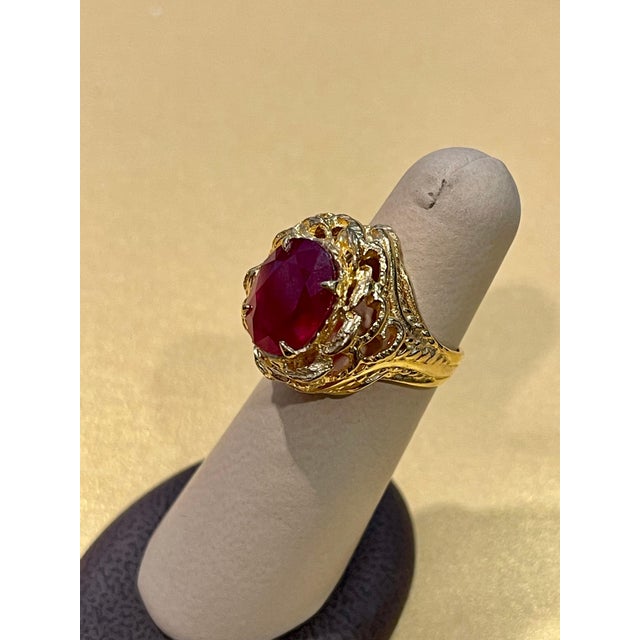 Metal 5 Carat Treated Oval Ruby 14 Karat Yellow Gold Cocktail Ring For Sale - Image 7 of 18