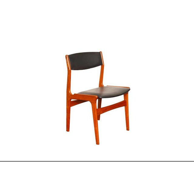 This exquisite set of five dining chairs —comprising three single chairs and two stately carver chairs—is a stunning...