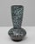 This 20th Century French fat lava ceramic vase features a bold, sculptural form and a richly textured glaze emblematic of...