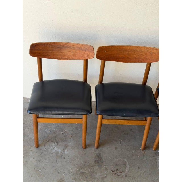 Mid-Century Modern Set of 4 Danish Teak Dining Chairs With Black Leather Seats | Mid-Century Modern 1960s For Sale - Image 3 of 11