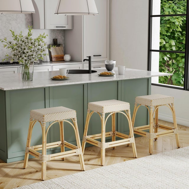 Evoking images of sidewalk tables in the Cote d'Azur, counter stools like this will give your kitchen, dining area, or...