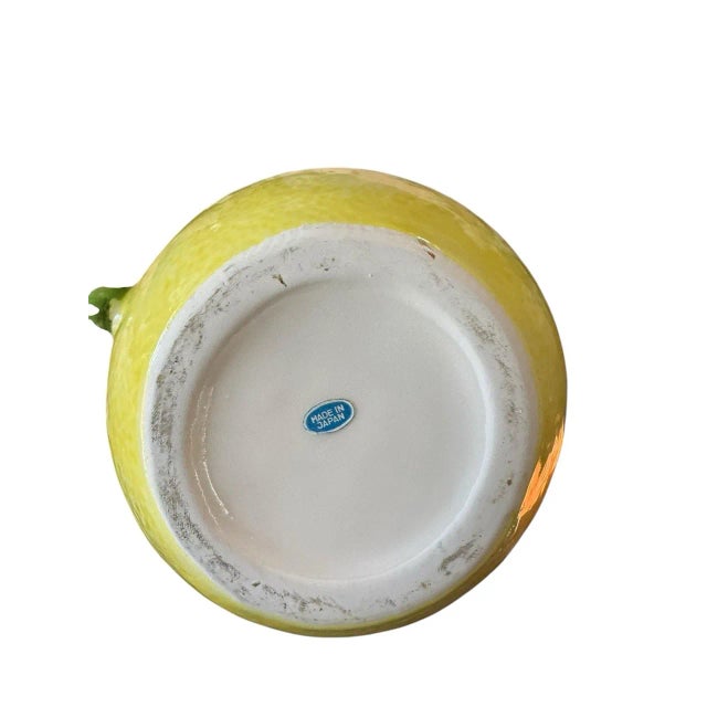 Vintage Lemon Shaped Pitcher with Green Leaves – Made in Japan Add a cheerful pop of color to your table or shelf with...