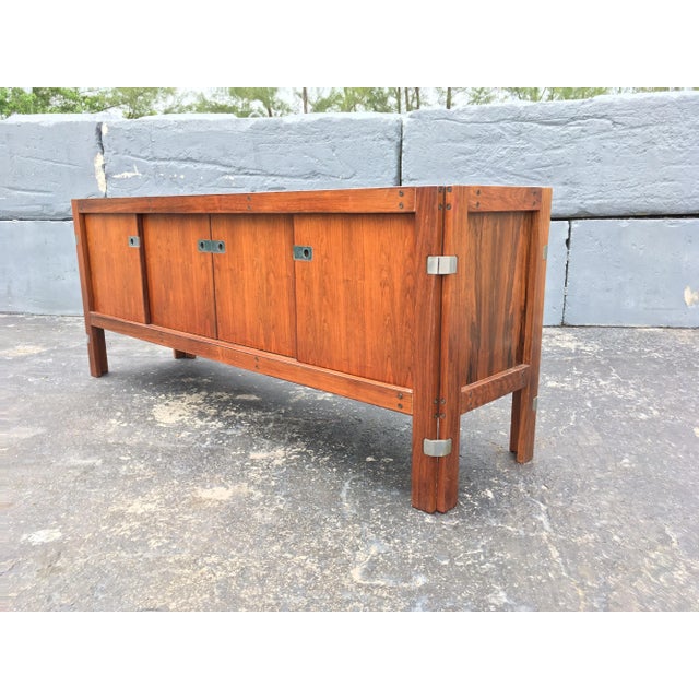 Beautiful Rosewood Credenza with removable hutch. Partly solid and veneered. Hutch is removable and has two glass sliding...