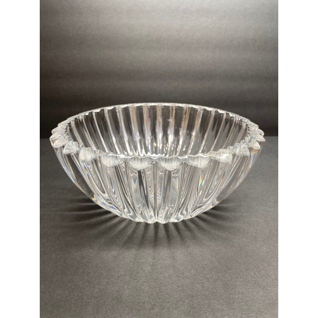 Elegant Tiffany & Co. Italian crystal bowl featuring a vertically fluted form and a distinctive heart-form scalloped rim....