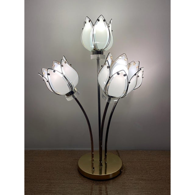 A rare and exceptionally sculptural vintage four-light lotus bouquet lamp dating to the early 1990s, featuring four...