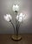 A rare and exceptionally sculptural vintage four-light lotus bouquet lamp dating to the early 1990s, featuring four...