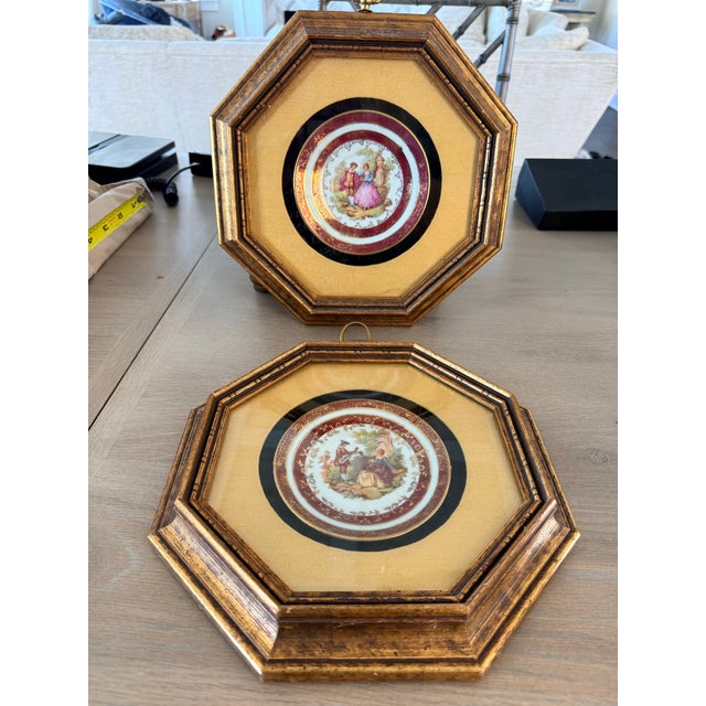 Set of two framed Fragonard plates from the 50-60s. Both plates have a Victorian courting scene. Matted in gold taffeta...