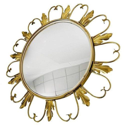 Beautiful vintage mid-century round gold sunburst fisheye butler mirror with leaves by the Belgian company Deknudt from...