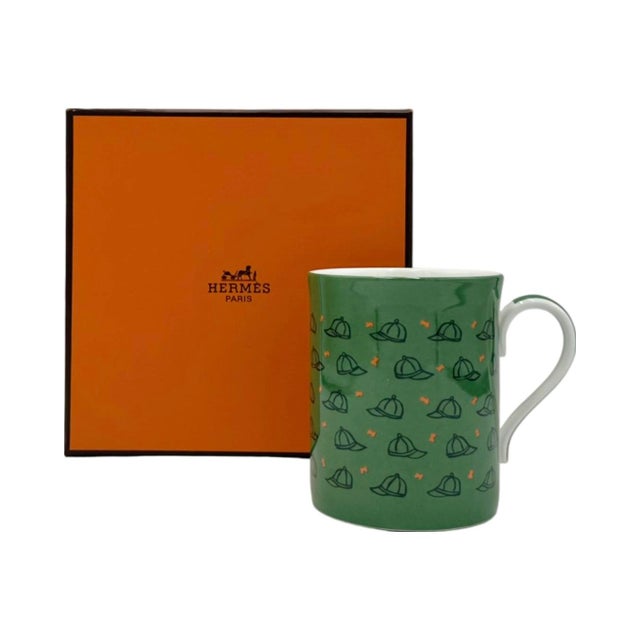 Details: -Charming Hermes Paris green porcelain mug with equestrian jockey cap motif -Comes with original box! -Approx....