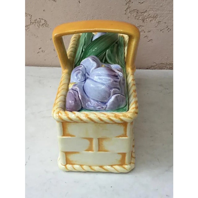Large Majolica basket with iris flowers signed Sarreguemines, circa 1920.