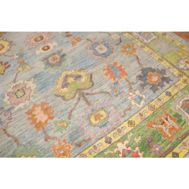 An early 21st Century Vintage Inspired 100% vegetable dyed hand-knotted wool Turkish Oushak Rug. 10'4'' x 13'7''