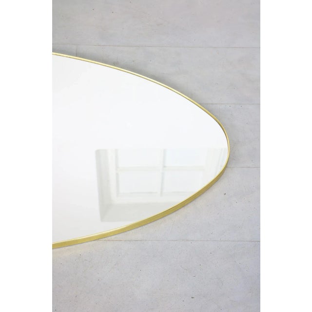 Vintage mirror with golden PVC framing. Could be placed vertically or horizontally above the bed (original use).