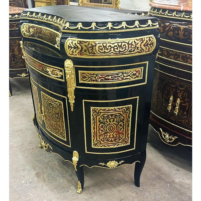 Feel like royalty with this beautiful black dresser with gold leaf details. Stunning French commode. Has a beautiful gold...