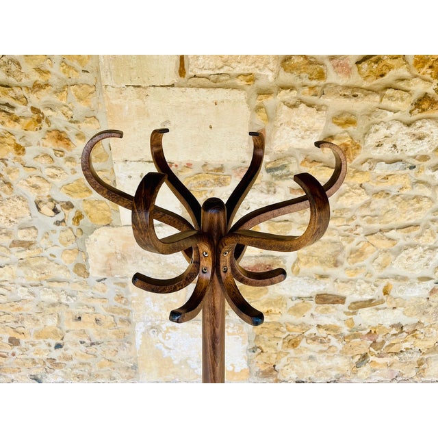 Mid-century, vintage, bentwood standing/floor coat and hat rack with twelve hooks from the 1960's/1970's. Piece is made of...