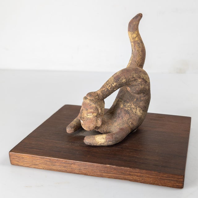 We are selling this cool pottery figure of an Acrobat. This piece is done in the Pre-Columbian style but is most likely...