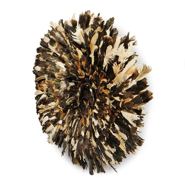 Beautiful vintage hand crafted original JuJu hat wall art. These attractive natural bird feather art form were originally...