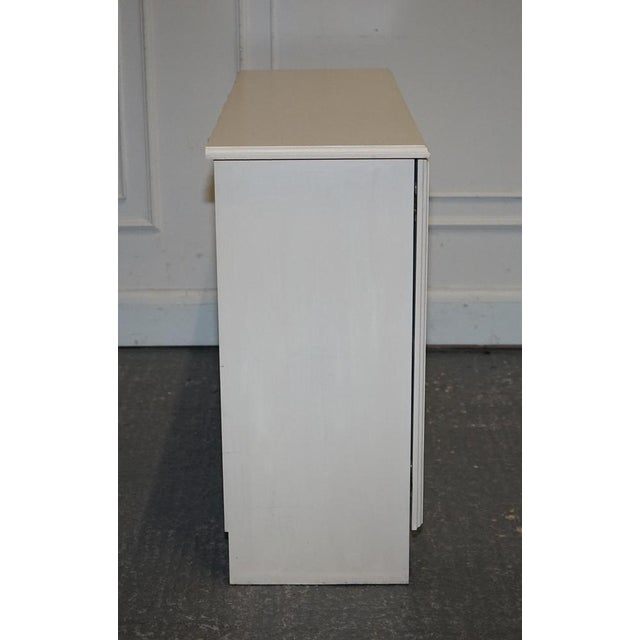 Minimalist Painted White Cupboard with Brass Knobs For Sale - Image 12 of 14