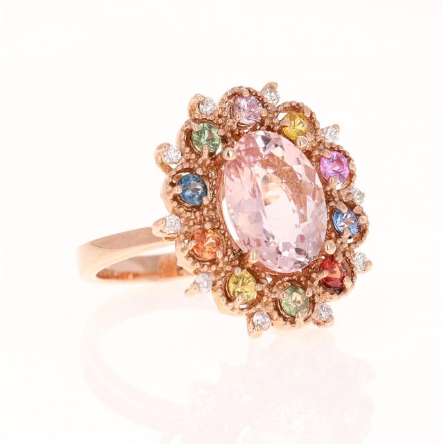 4.37 Carat Morganite Diamond Multi Color Sapphire Rose Gold Cocktail Ring This ring has a natural oval cut pink morganite...