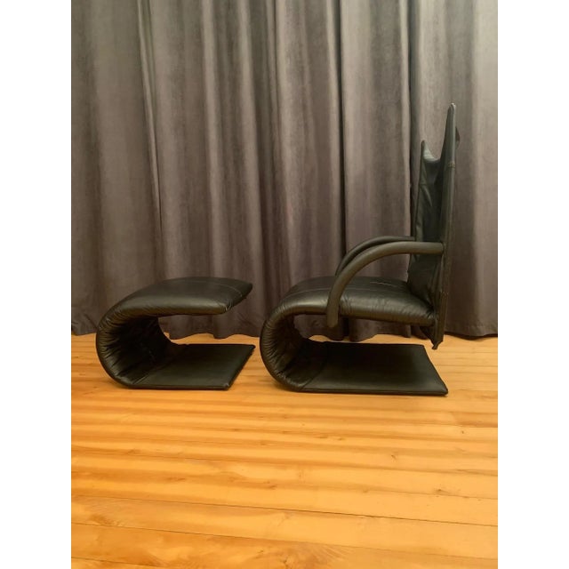 Zen armchair with footrest designed by Claude Brisson for Ligne Roset, 1980. In original and very good condition. The set...
