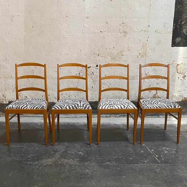 Handsome Mid-Century Swedish Modern Dining Chairs in solid beech wood. Newly restored and reupholstered in a high end...