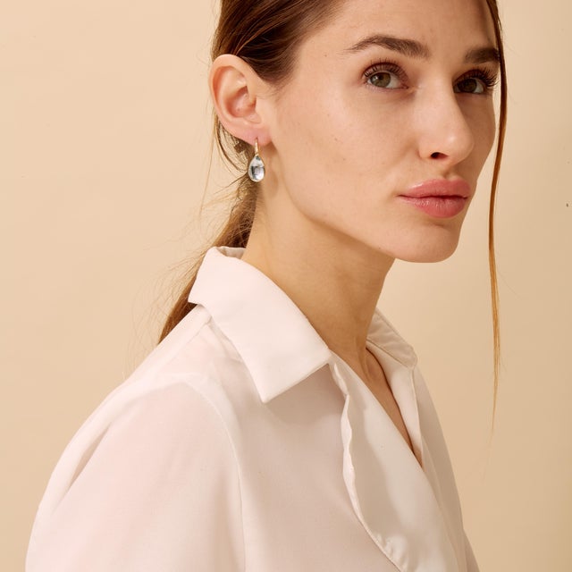 Created in 18 karat yellow gold Blue topaz 15 carats approx. Diamonds 0.05 carat approx. Limited edition Fabricated in...