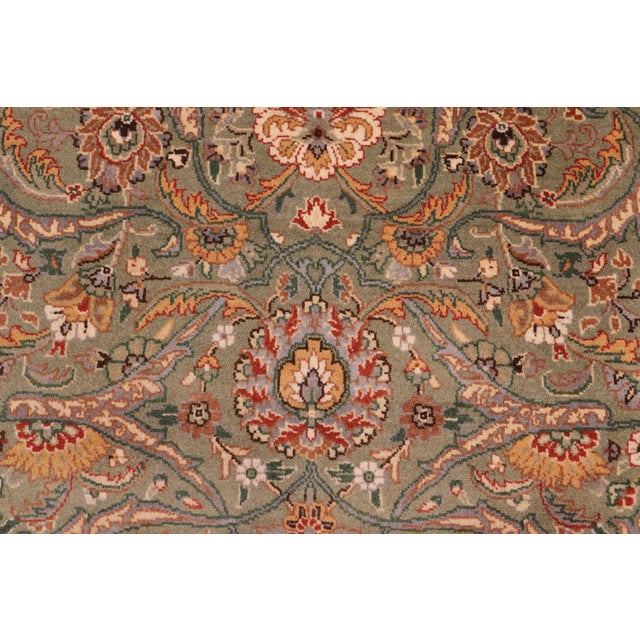 Designed with mesmerizing intricacy and gorgeous color palette, this hand-knotted masterpiece demonstrates the beauty and...