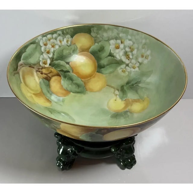 Antique Jean Pouyat Limoges Punch Bowl, Hand-Painted with Original Figural Stand, France An antique hand-painted porcelain...