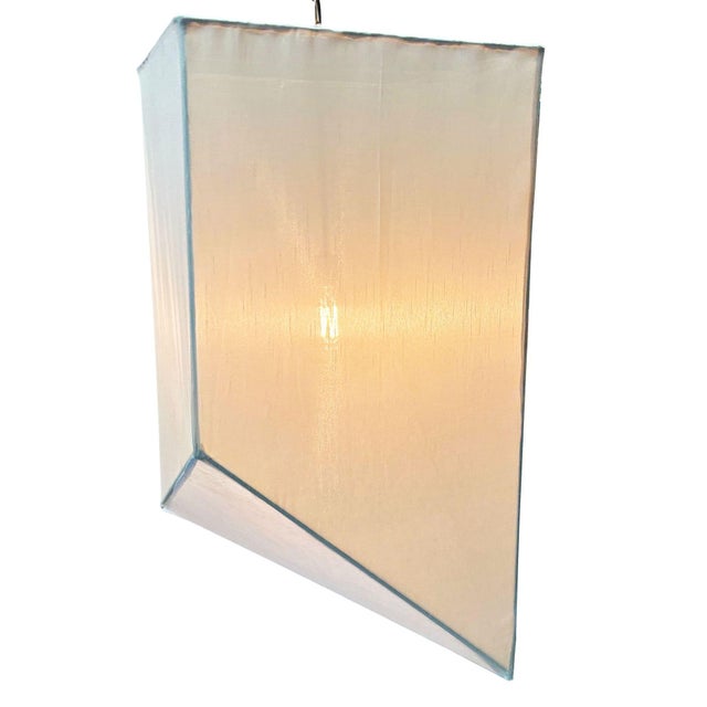 Isamu Noguchi-inspired geometric linen chandelier lantern featuring a five-sided asymmetrical geometric handmade shade....