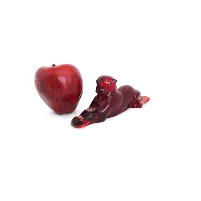 Sleek, powerful, and deeply saturated in color, this 8-inch glass stalking panther captures the height of Hollywood...