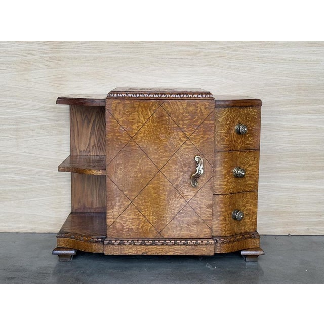 This pair of circa 1930s French Art Deco side cabinets could be used to flank a sofa or as nightstands. Each has a storage...