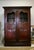 Stunning English, hand-carved, solid wood armoire with wire panels. This piece was recently refinished and is in great...