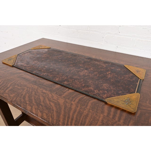 A gorgeous set of four Art Deco or Arts & Crafts period gilt bronze and abalone blotter corners, with a faux tortoise...