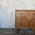 A beautifully proportioned mid-century walnut and oak chest of drawers with a geometric arrangement of contrasting timber...