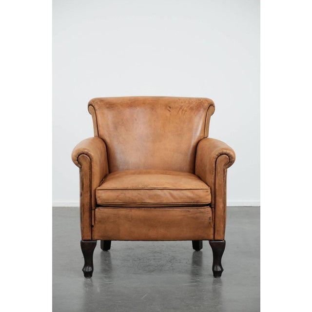 We are offering this beautiful, subtle vintage sheepskin armchair with a lovely light color and elegant legs. This...