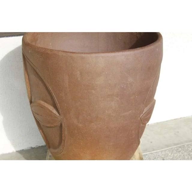 Stan Bitters planter with incised floral motif on both sides. This vessel was designed by one of California's great...