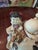 A fine large vintage Hollywood Glamour sculpture of a Buddha riding a bull carriage artist signed. Having tremendous...