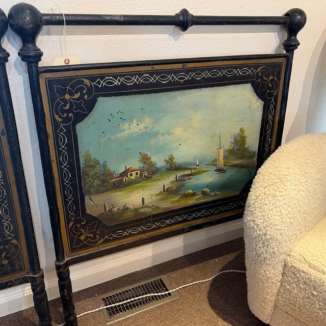 Early 19th C iron campaign bed with nautical scenes, painted on the headboard and footboard