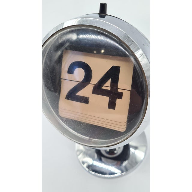 This perpetual flip calendar from the 1970s was designed in the spirit of the Space Age, with a hemispherical body made of...