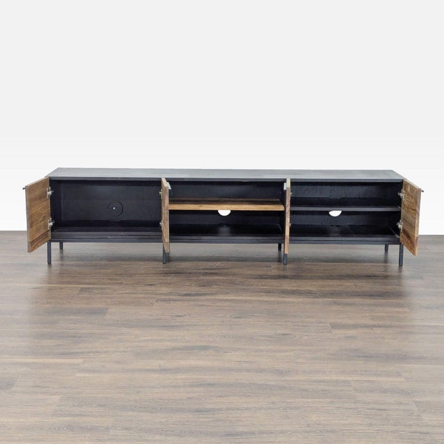 Solid Teak doors and shelves with a steel tube base in black. Brand: Crate & Barrel . Original Price: $1698. Dimensions...