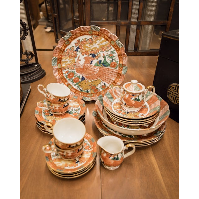 A beautiful Mid-Century Arita Imari Peacock China Set with full dinner service for four. The set includes: Serving Pieces...