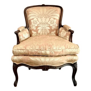 Antique Louis XV Style Bergère With a Carved Wood Frame, Upholstered Back, Outscrolled Arms & Cabriole Legs For Sale