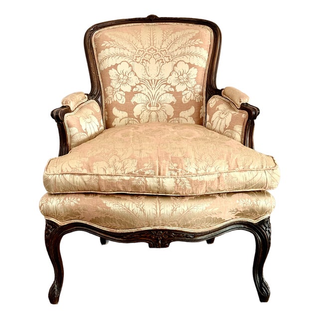Antique Louis XV Style Bergère With a Carved Wood Frame, Upholstered Back, Outscrolled Arms & Cabriole Legs For Sale