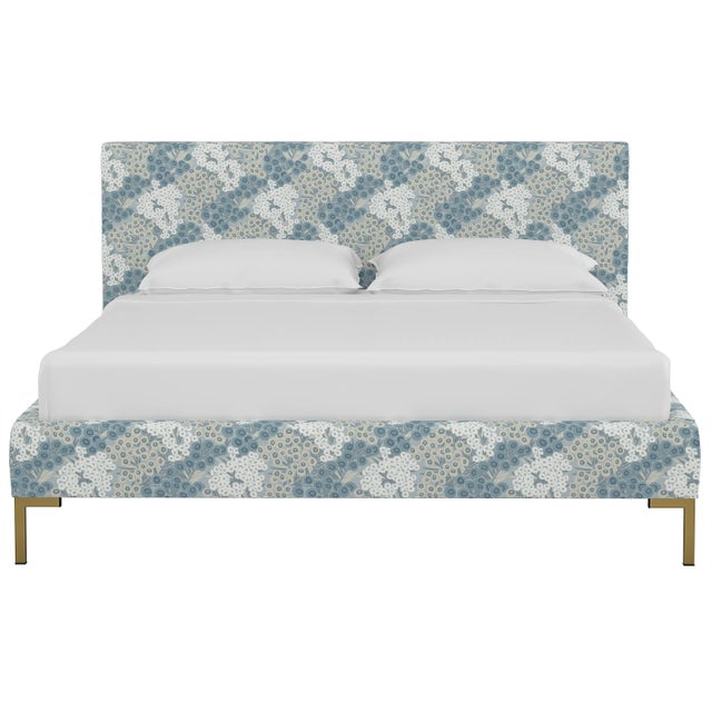 This low profile fully upholstered platform bed is a perfect piece for anyone looking to add a modern statement piece to...