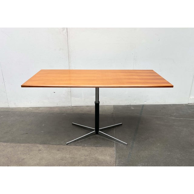 Height-adjustable table by Wilhelm Renz, based on a design by J.M. Thomas from the 1960s. High-quality materials and...
