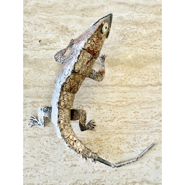 A finely crafted articulated lizard sculpture designed by celebrated Taxco silversmith Emilia Castillo, one of the most...