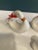 A delightful set of six vintage ceramic napkin rings designed in the form of graceful swans. The sculptural curves and...