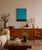 with this minimalist composition, color becomes the main subject. A vast field of luminous turquoise meets a band of deep...