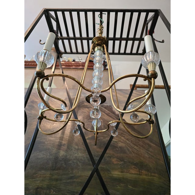 A magnificent and iconic mid century modern vintage original Italian chandelier ( guaranteed a vintage handmade crafted...